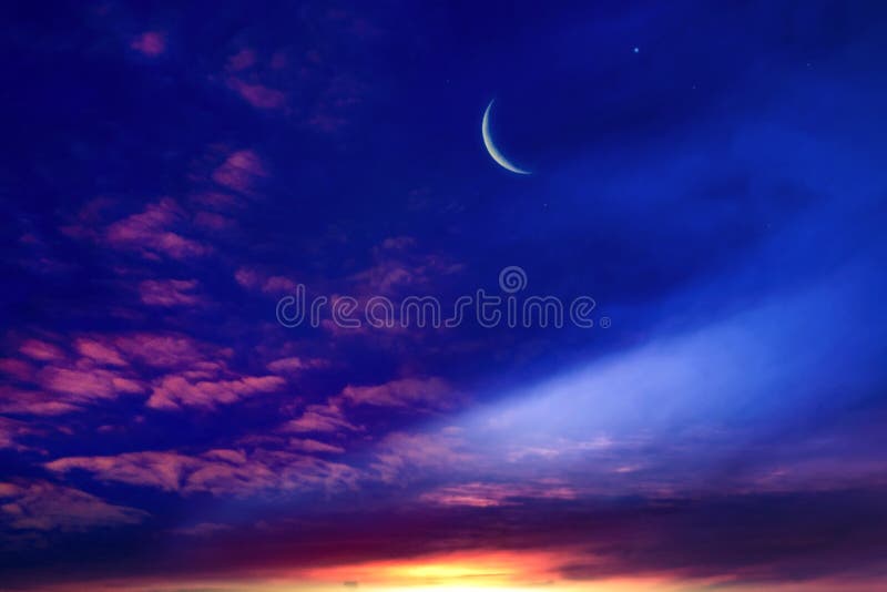 Crescent moon with beautiful sunset background . Generous Ramadan .