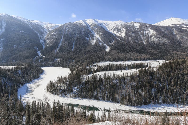 Crescent Moon Bend or Yue Liang Wan in Winter, Kanas Lake, Kanas Nature Reserve, Xinjiang, China