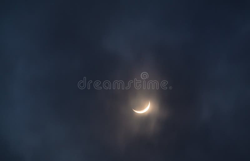 Crescent moon in light clouds royalty free stock photo Crescent moon in light clouds royalty free stock photo