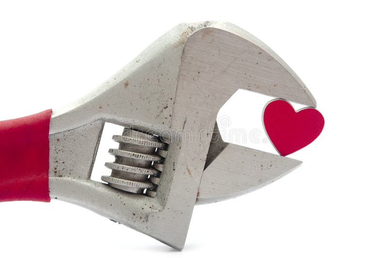Crescent wrench and heart stock image. Image of symbol 38500305