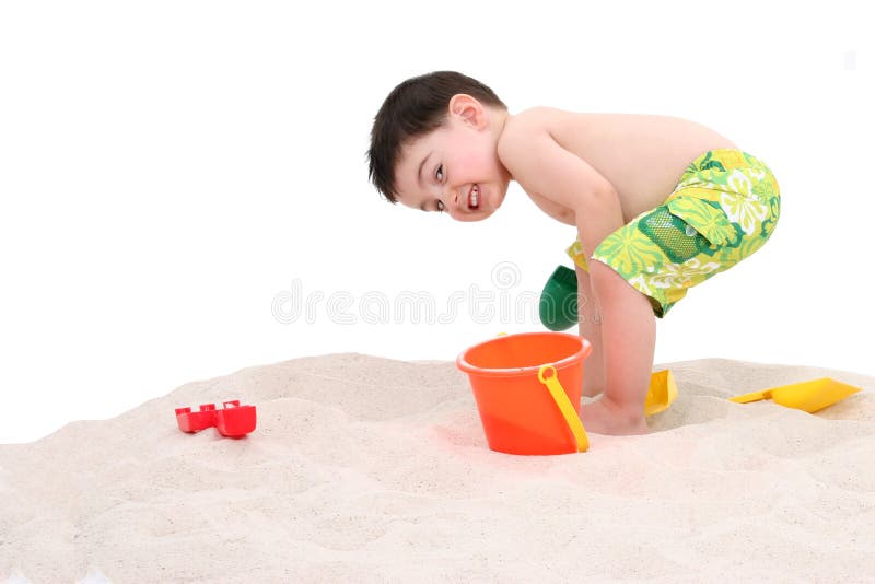Criança do menino da praia com sorriso grande imagens de stock royalty free Criança do menino da praia com sorriso grande imagens de stock royalty free