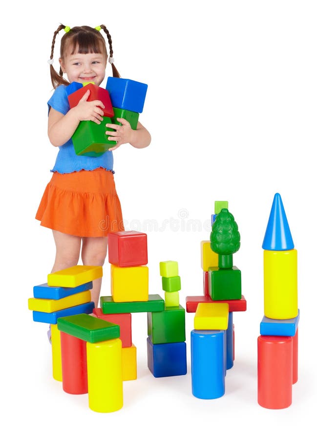 Crianças de sorriso felizes que jogam com brinquedos coloridos imagens de stock Crianças de sorriso felizes que jogam com brinquedos coloridos imagens de stock