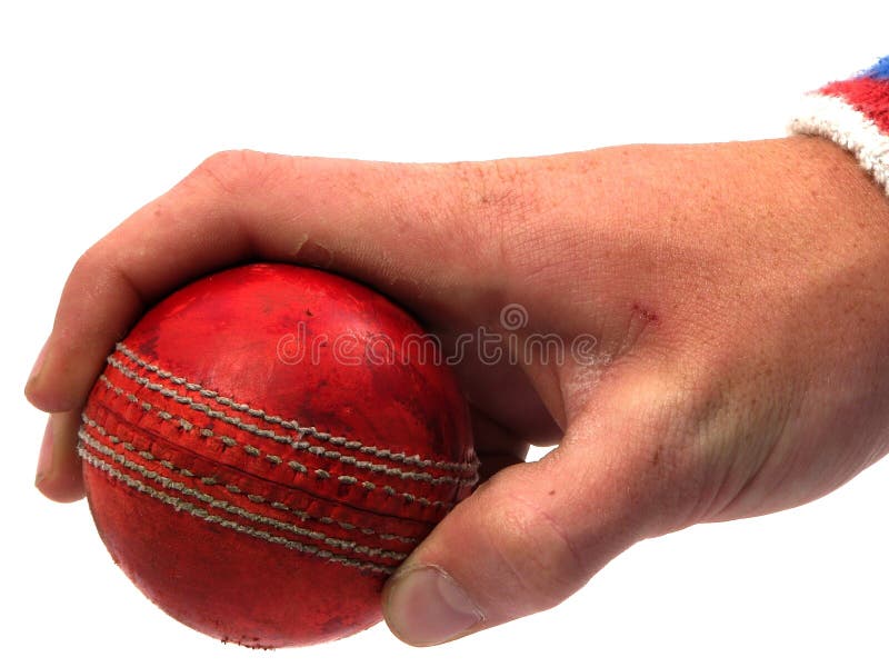 Cricket ball held by hand