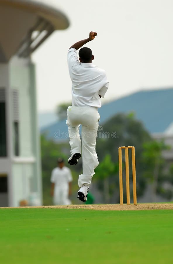 A cricket bowler stock photo. Image of player, bowling 1084634