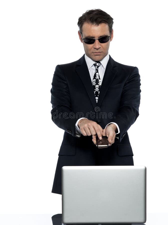 Criminal man computer hacker satisfied on phone stock photos