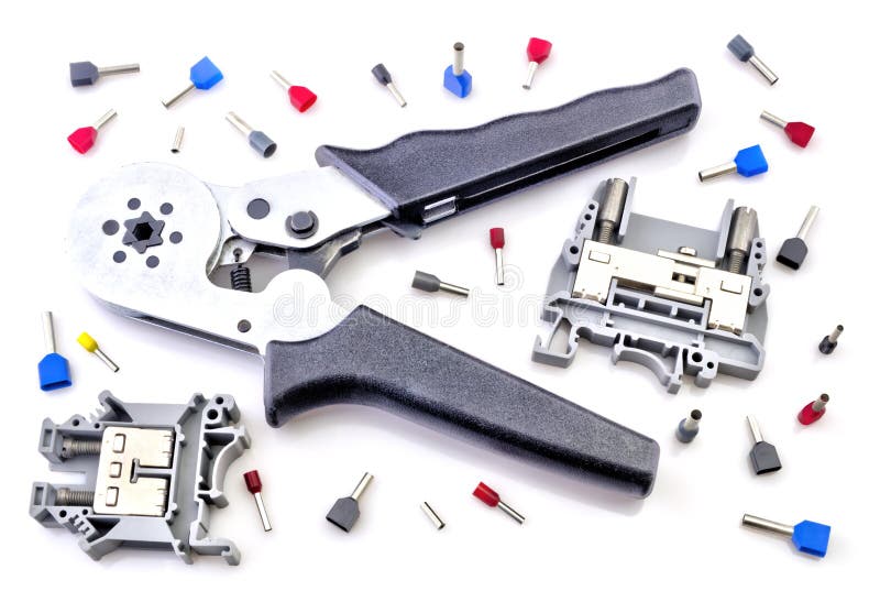 Crimping tool and electrical connectors on white background royalty free stock image