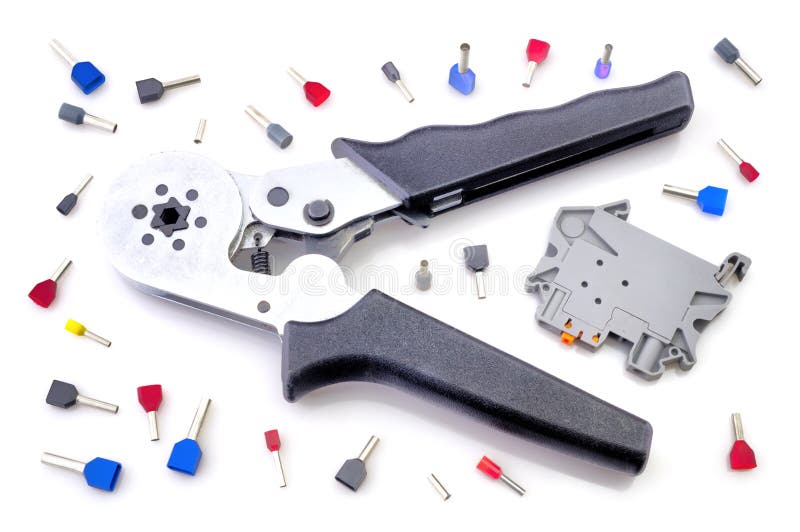 Crimping tool and electrical connectors on white background stock photos