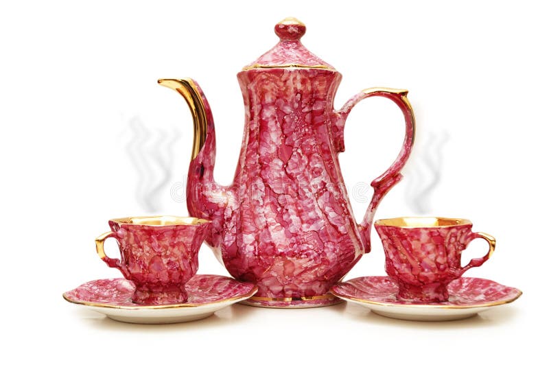 Crisol y tazas del té aislados foto de archivo