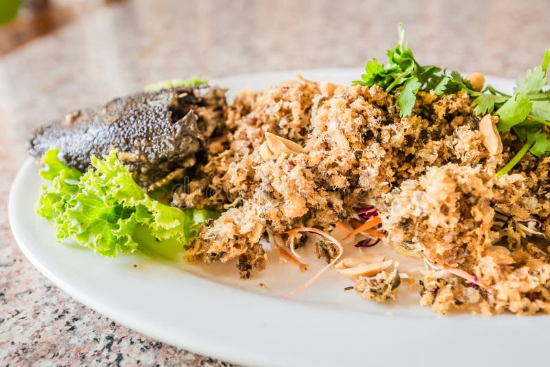 Crispy Catfish Salad with Green Mango and Fresh Vegetable Stock Photo