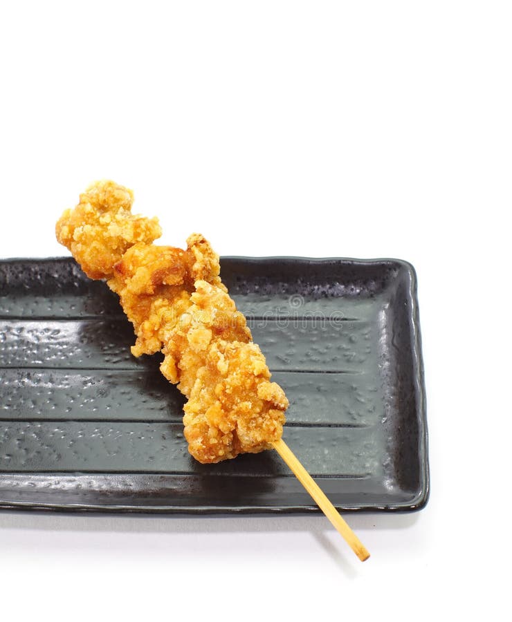 Crispy deep fried chicken with skewer