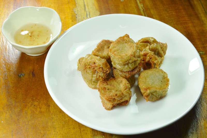 Crispy Deep Fried Crab Meat Roll in Flour Dipping with Plum Sauce Stock