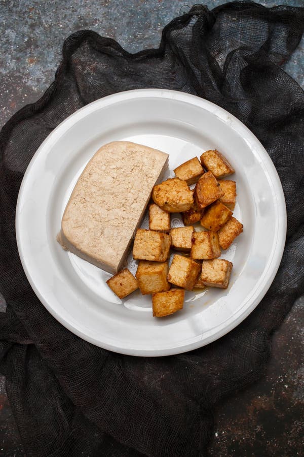 Crispy Deep Stir Fried Tofu Cubes on Small Dish Stock Image - Image of