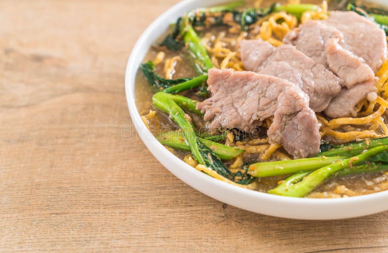 Crispy Egg Noodles with Chinese Broccoli and Pork Stock Image Image