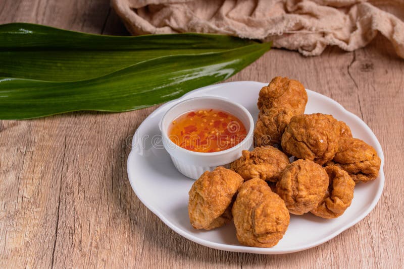 Crispy Fish Balls with Sweet and Spicy Dipping Sauce Stock Image