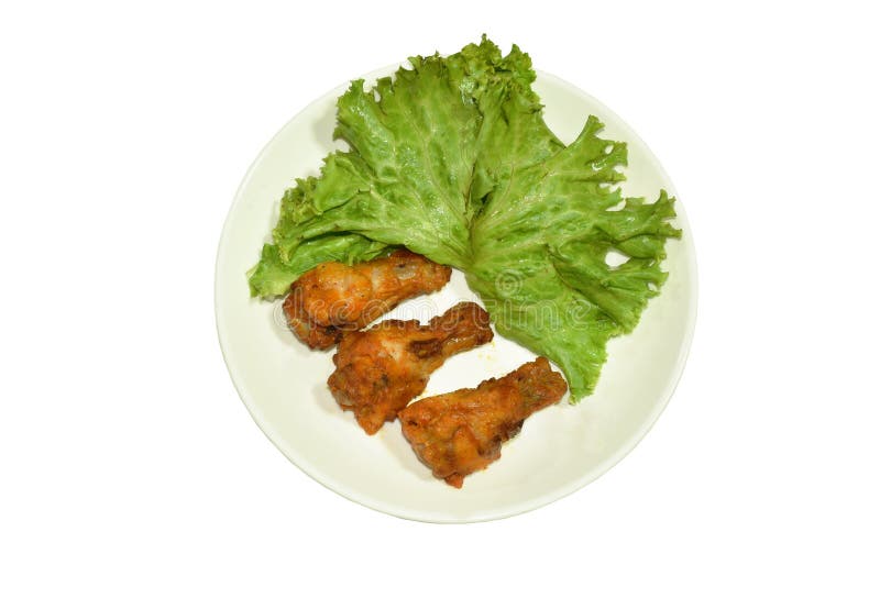 Crispy Fried Chicken Drum Wing with Barbecue Sauce and Vegetable on