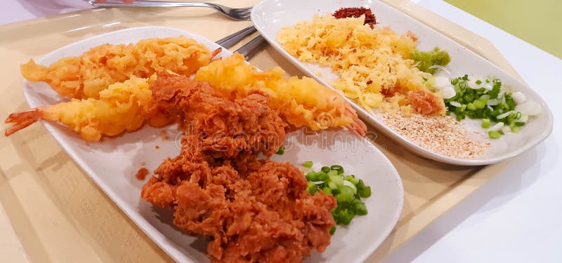 HOT AND CRISPY DELICIOUS FRIED CHICKEN AND FRIED PRAWN CALLED TEMPURA IS AN ASIAN DISH SPECIALLY MADE IN CHINA . HOT AND CRISPY DELICIOUS FRIED CHICKEN AND FRIED PRAWN CALLED TEMPURA IS AN ASIAN DISH SPECIALLY MADE IN CHINA .
