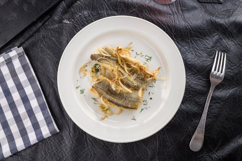 Crispy fried fish fillet on black table royalty free stock images Crispy fried fish fillet on black table royalty free stock images