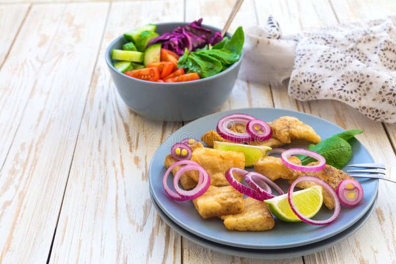 Crispy Fried Fish Tilapia and Green Vegetable Salad Stock Image Image