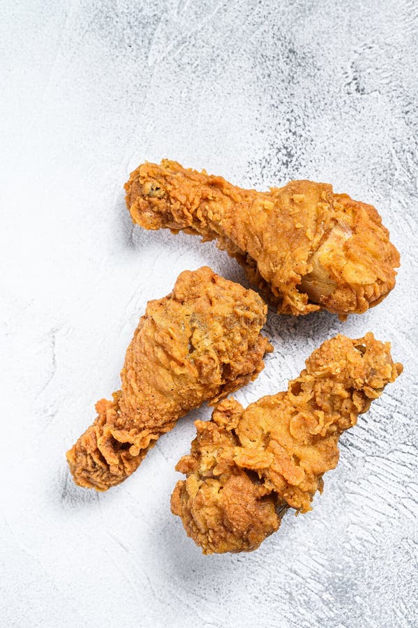 Crispy Kentucky Fried Chicken Drumstick. White Background. Top View