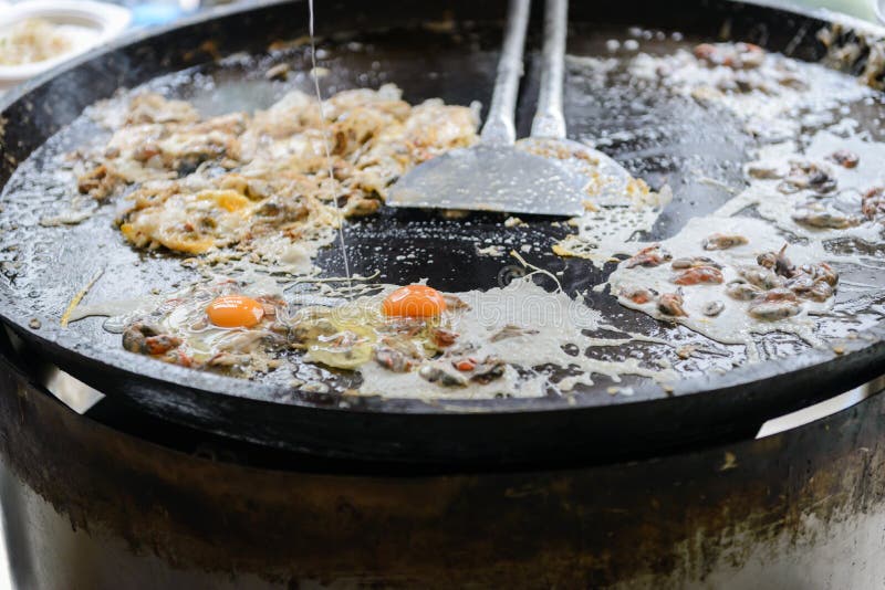 Crispy Oyster Omelette made from flour mixed with mussel or oysters and egg stock images Crispy Oyster Omelette made from flour mixed with mussel or oysters and egg stock images