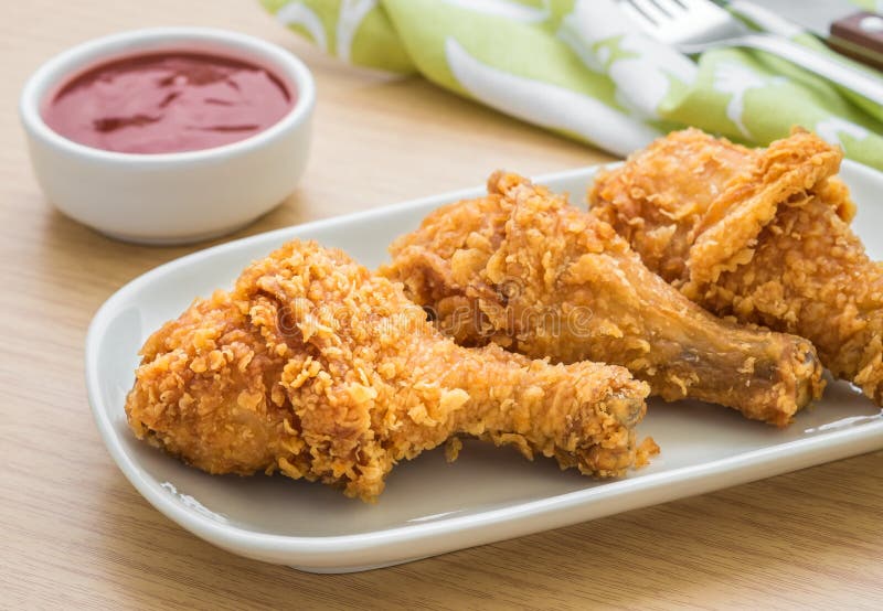 Crispy fried chicken on white plate and dip sauce. Crispy fried chicken on white plate and dip sauce