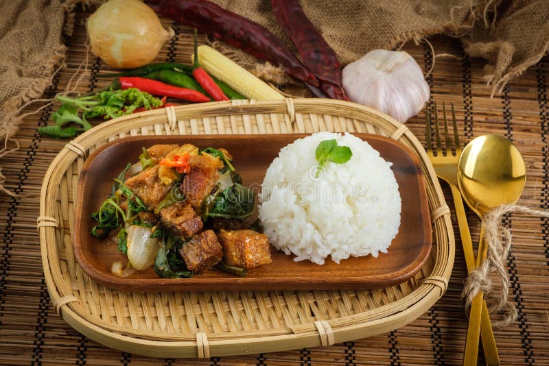 Crispy Pork Belly with Thai Basil. Classic Thai Dish Stock Image