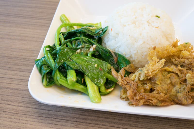 Crispy Pork with Kale stock image. Image of lunch, rice 187381565