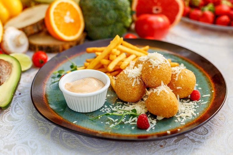 Cheese Balls with French Fries and Sauce Stock Image - Image of tasty,  snack: 180112499