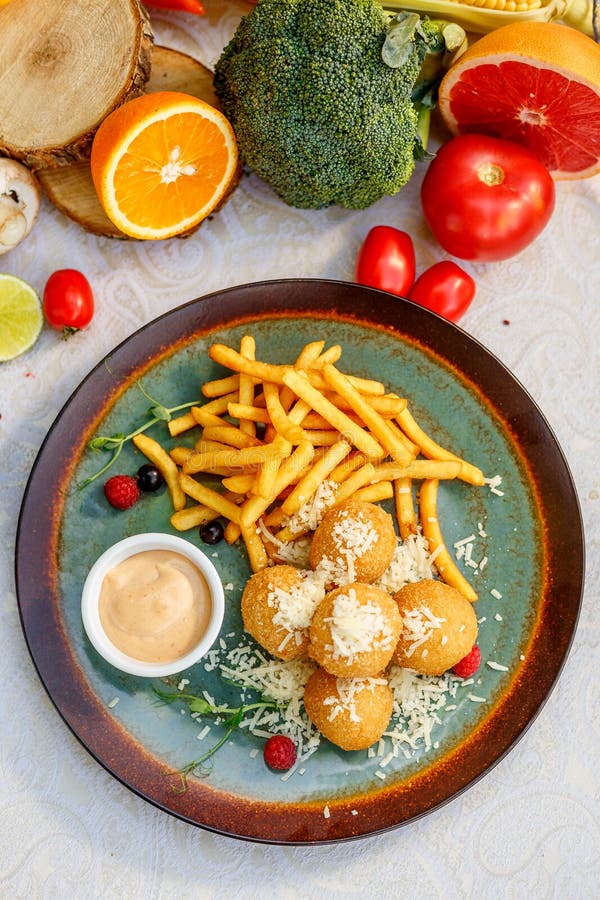 Cheese Balls with French Fries and Sauce Stock Image - Image of tasty,  snack: 180112499