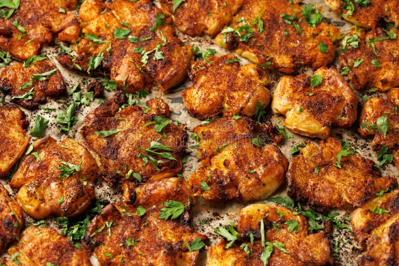 Crispy smashed potatoes baked with herbs stock image
