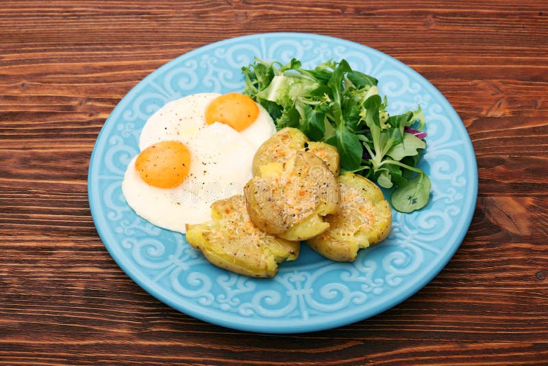 Crispy smashed potatoes breakfast. stock photos