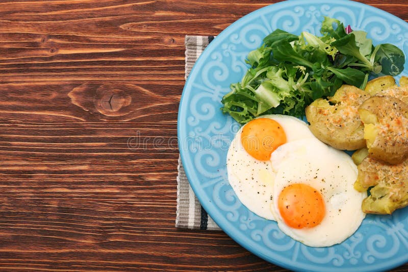 Crispy smashed potatoes breakfast. royalty free stock photography
