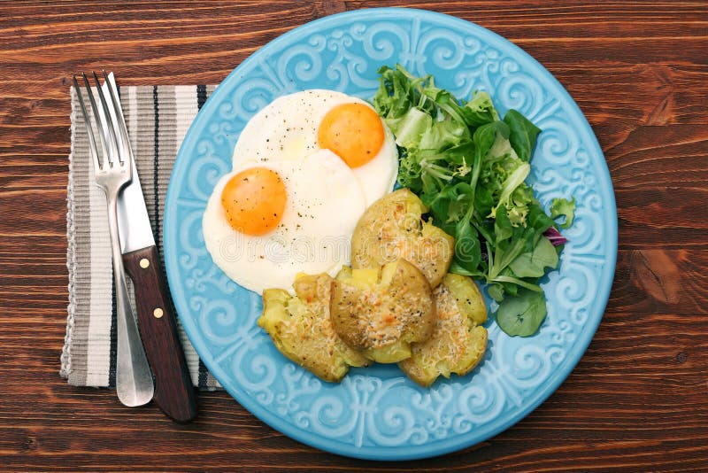 Crispy smashed potatoes breakfast. stock image