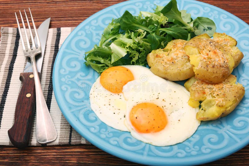 Crispy smashed potatoes breakfast. royalty free stock photo