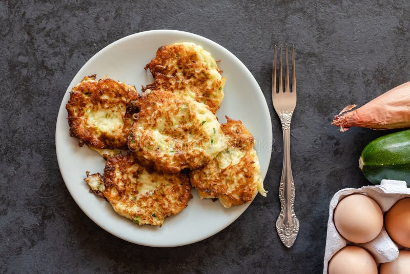 Crispy zucchini fritters stock image. Image of calories 175711223