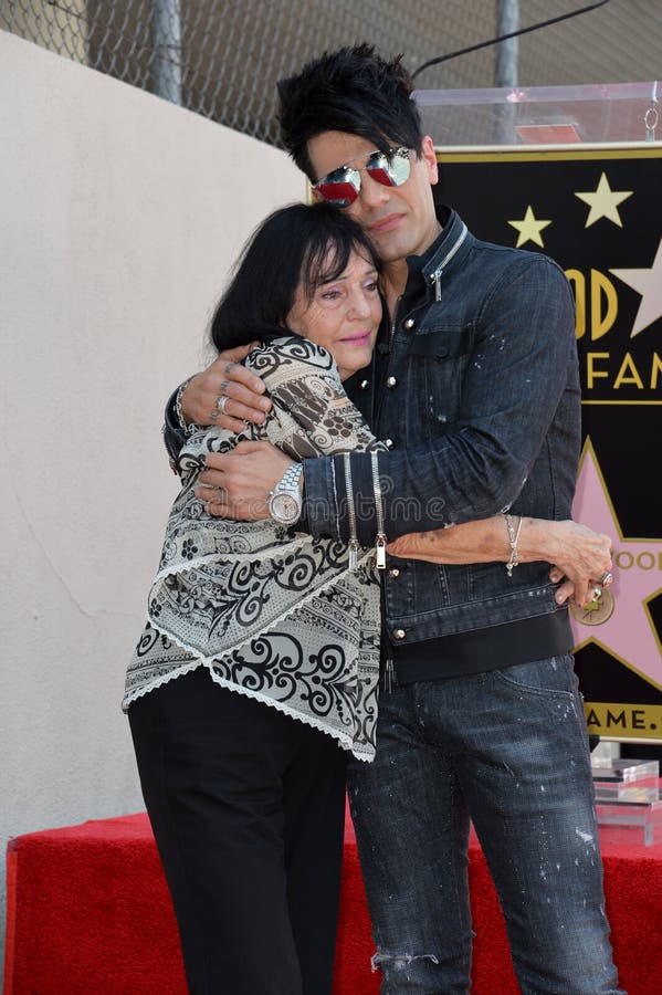 LOS ANGELES, CA - July 20, 2017: Criss Angel & mother Dimitra Sarantakos at the Hollywood Walk of Fame Star Ceremony honoring illusionist Criss Angel. LOS ANGELES, CA - July 20, 2017: Criss Angel & mother Dimitra Sarantakos at the Hollywood Walk of Fame Star Ceremony honoring illusionist Criss Angel