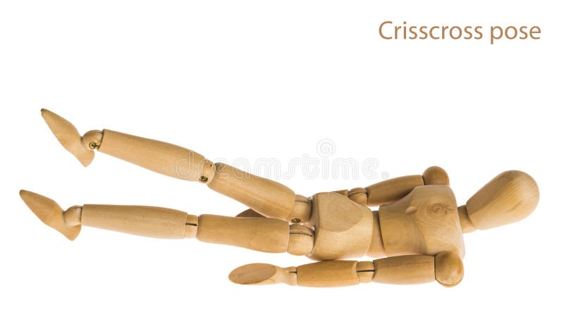 Crisscross exercise demo. Demonstration of wood manikin in Crisscross exercise pose on white background stock images Crisscross exercise demo. Demonstration of wood manikin in Crisscross exercise pose on white background stock images
