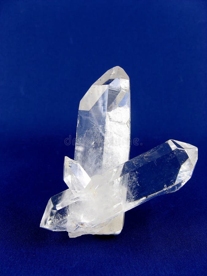 An optically clear double-terminated quartz crystal attached to a second. Of particular importance in alternative medicine and crystal healing because the double termination enhances and focuses the power of the crystal. An optically clear double-terminated quartz crystal attached to a second. Of particular importance in alternative medicine and crystal healing because the double termination enhances and focuses the power of the crystal
