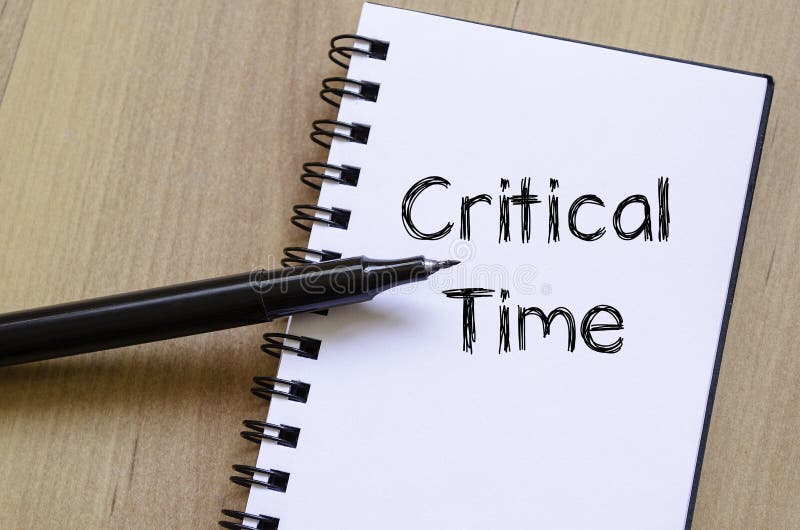 Critical time write on notebook stock image