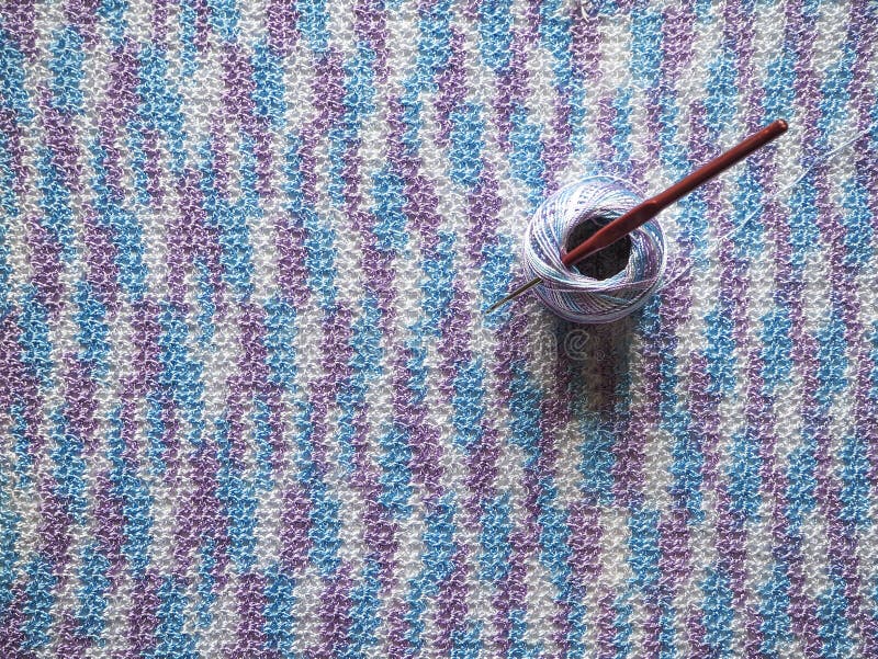 Crocheted Fabric Made of Multicolored Microfiber. Melange Thread