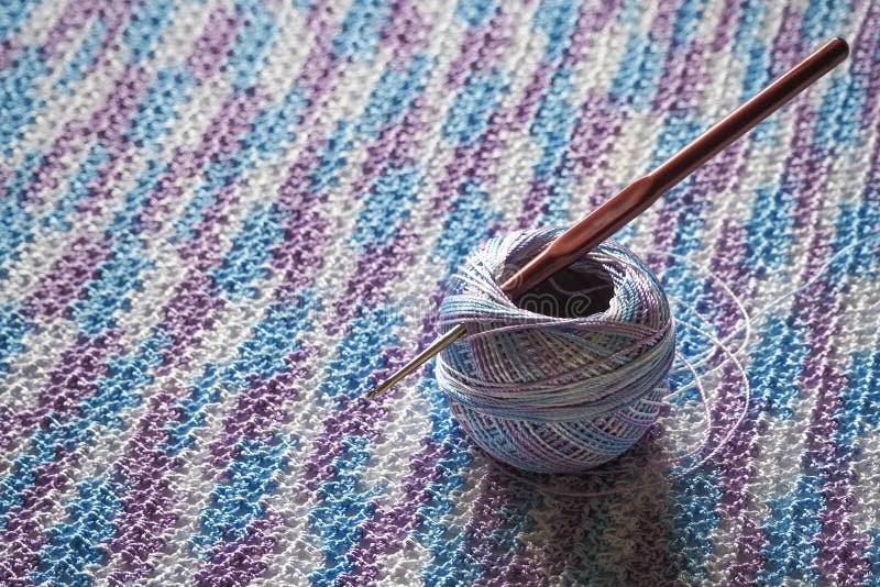 Crocheted Fabric Made of Multicolored Microfiber. Melange Thread