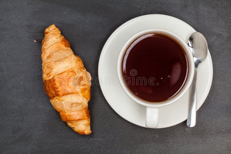 Croissant, cup of tea or