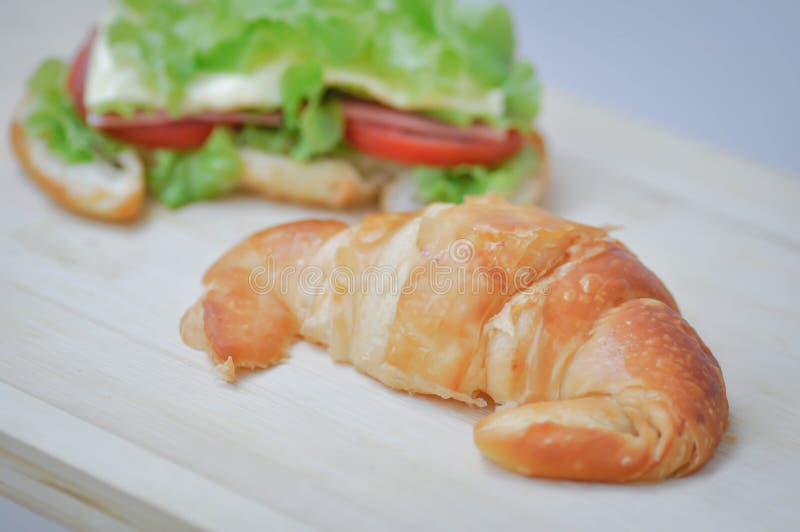 Croissant sandwich or ham and cheese sandwich royalty free stock photography
