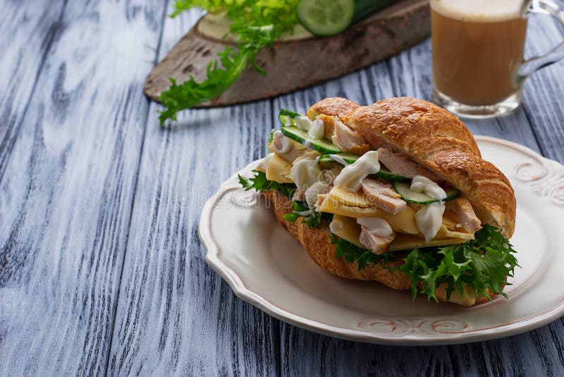Croissant Sandwich with Chicken, Cheese, Cucumber Stock Photo Image