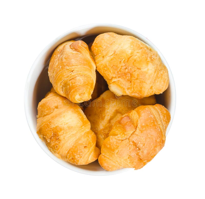 Croissants in een ronde die plaat op witte achtergrond wordt geïsoleerd royalty-vrije stock fotografie Croissants in een ronde die plaat op witte achtergrond wordt geïsoleerd royalty-vrije stock fotografie