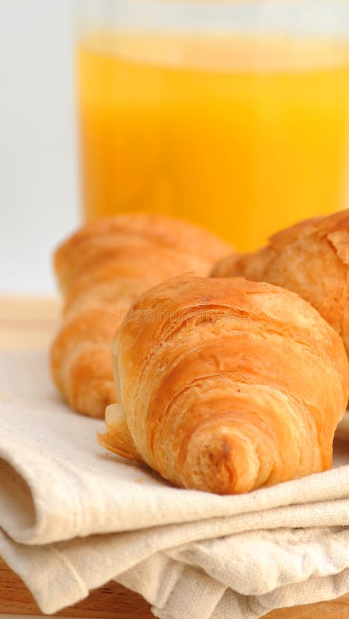 Croissants with orange juice