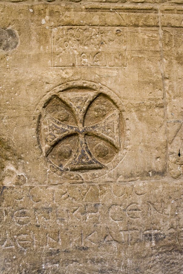 Coptic cross on a piller at Philae Temple on the Nile River in Egypt. Coptic cross on a piller at Philae Temple on the Nile River in Egypt