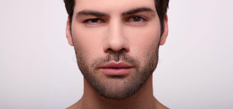 A Cropped Frame, a Portrait of a Serious Caucasian Guy with Dark Hair and  Brown Eyes Stock Image - Image of gorgeous, beautiful: 170863077