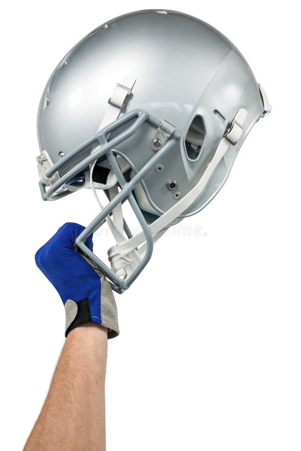 Cropped image of American football player handing his helmet stock images Cropped image of American football player handing his helmet stock images