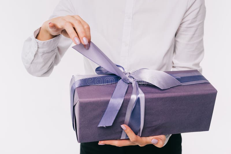 cropped image of businesswoman opening present box stock photo cropped image of businesswoman opening present box stock photo